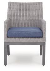 Back view of outdoor arm chair showing frame and wicker