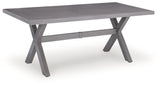 Side angle of outdoor dining table with four chairs