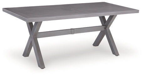 Side angle of outdoor dining table with four chairs