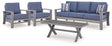 Outdoor sofa and chair angle showing blue gray resin wicker