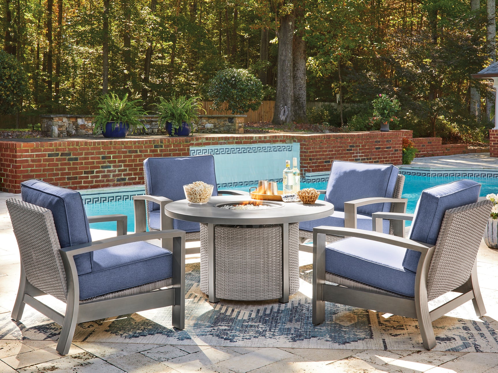 Detailed view of resin wicker texture on outdoor fire pit chair
