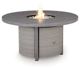 Fire pit table with active flame and glass beads view