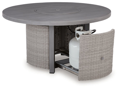 Storage cabinet door of fire pit table open