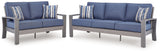 Close-up of Moon Beach loveseat arm in gray resin wicker