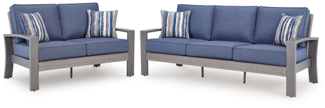 Close-up of Moon Beach loveseat arm in gray resin wicker