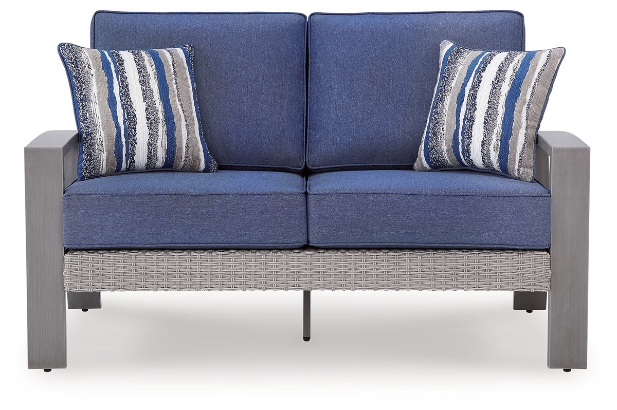 Front view of Half Moon Beach outdoor loveseat with cushions
