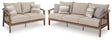 Harmony Outdoor Sofa side angle showing woven resin wicker