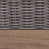 Close-up of wood-look aluminum frame and woven resin wicker finish