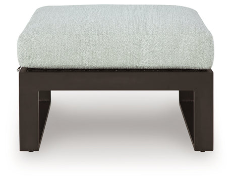 Ottoman detail with black wicker finish