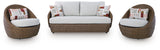 Double beige outdoor sofa set with loveseat, lounge chairs, and coffee table