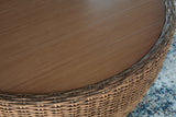 Close-up detail of woven resin wicker and stainless steel hardware