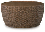 Double Point Outdoor Coffee Table side angle highlighting woven resin wicker and aluminum frame