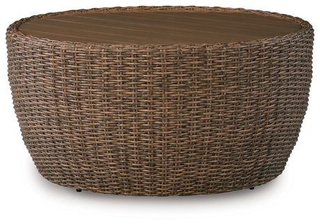 Double Point Outdoor Coffee Table side angle highlighting woven resin wicker and aluminum frame