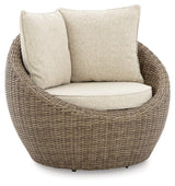 Danson Beige Swivel Lounge Chair angled view
