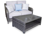 Side angle of Elite Gray Park Outdoor Loveseat highlighting aluminum frame and cushion detail