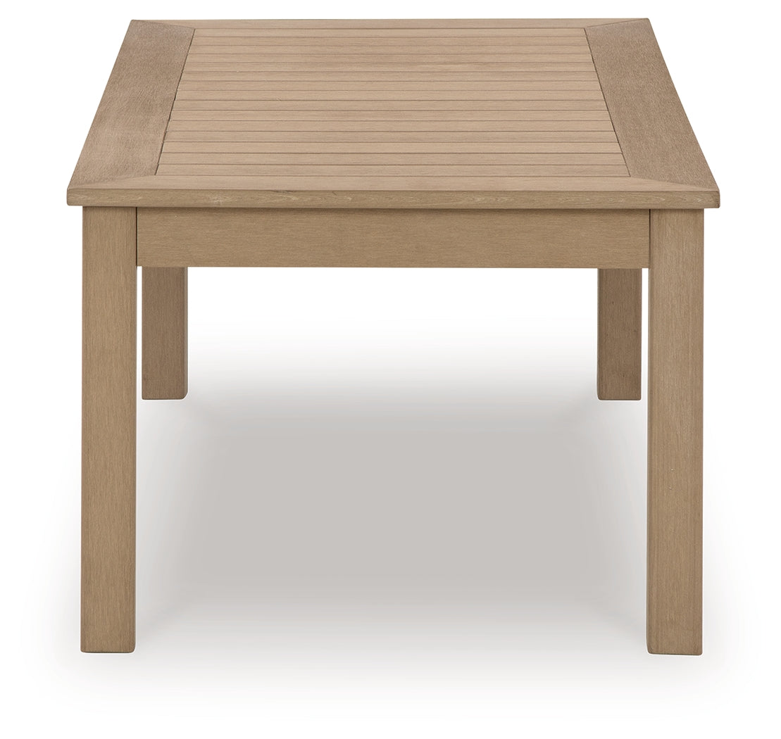 Side view of Hallow Creek Outdoor Coffee Table in driftwood finish