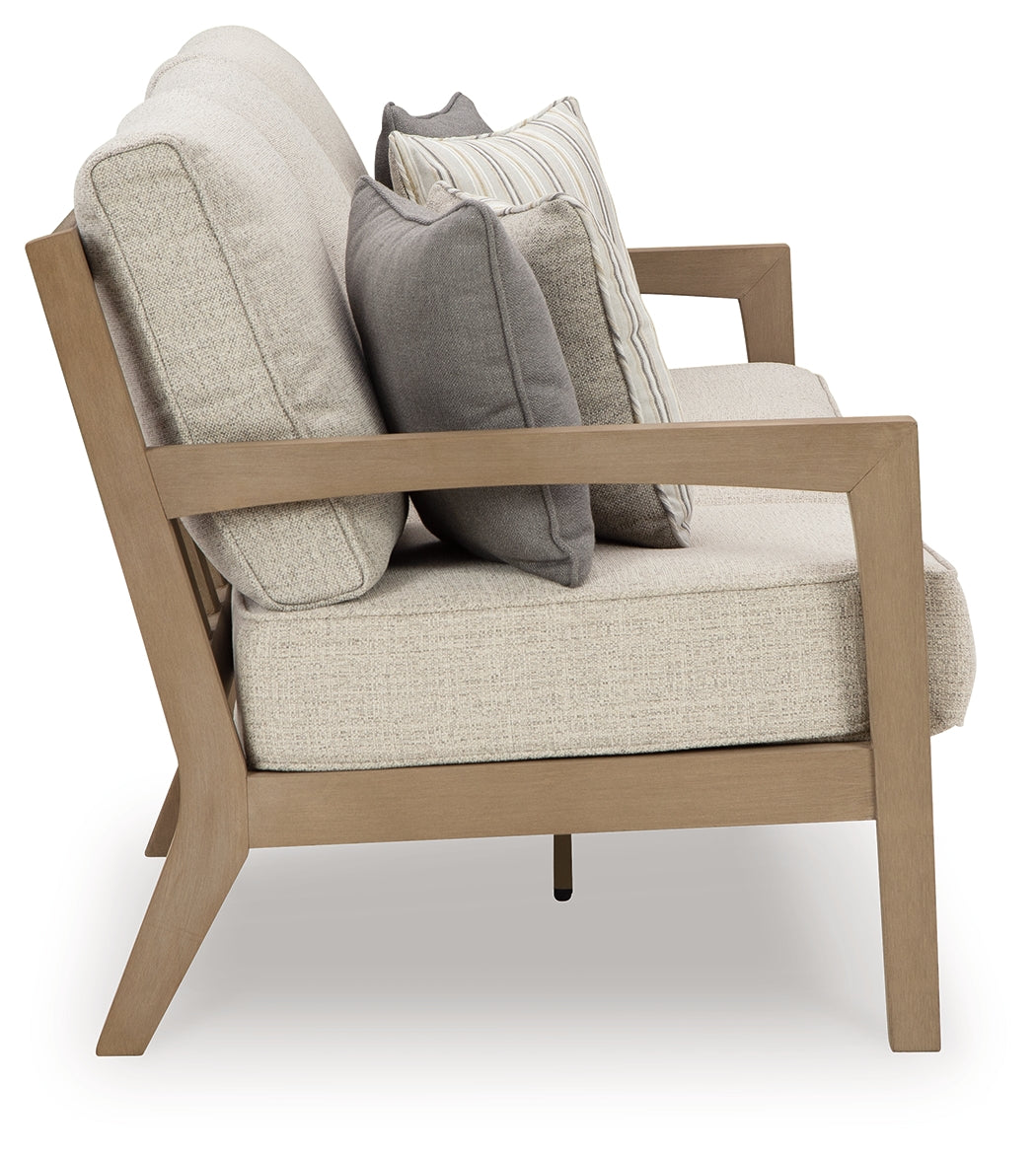 Hallow Driftwood Creek outdoor sofa and loveseat with coffee table in driftwood finish