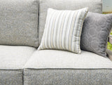 Close-up of four throw pillows on Hillside Barn outdoor sofa
