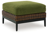 Horizon Hall ottoman angled side view showing resin wicker