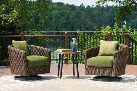 Green upholstered lounge chair side view