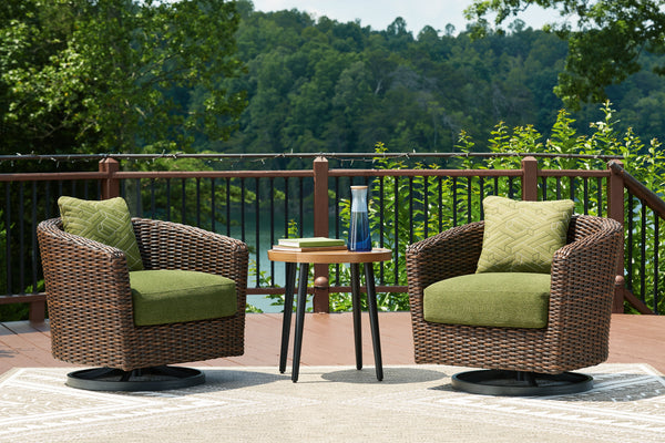 Green upholstered lounge chair side view