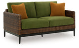 Side view of Horizon outdoor sofa with green upholstery
