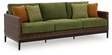 Side angle of Horizon Hall outdoor sofa showing wicker and cushion detail