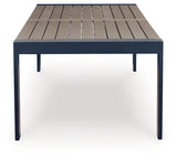 Side profile displaying East Beach outdoor dining table aluminum frame and wood-look surface