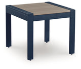 East Beach Outdoor End Table front view showing navy blue frame and wood-look top