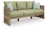 Side angle of Serena Shores outdoor sofa showing curved design