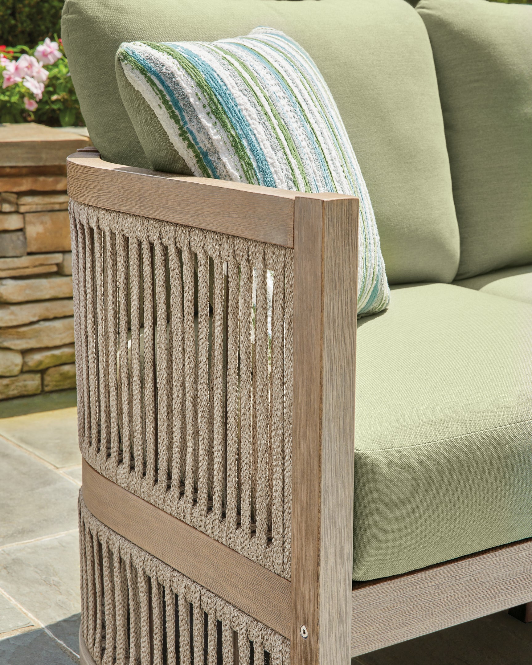 Close-up of eucalyptus wood and rope weave detail