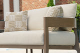 Serene Bay loveseat styled with decorative pillows