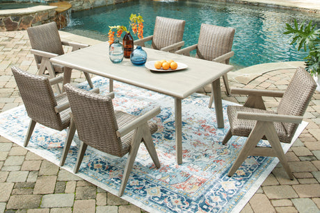Outdoor dining table detail showing wood-look top