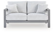 Hurley Park Outdoor Loveseat front angled view showing gray Nuvella fabric