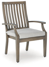 Rainier Ranch outdoor arm chair angled side view showing frame and cushion