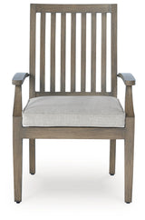 Rainier Ranch outdoor dining table and four beige cushioned chairs