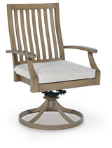 Swivel chair side view showing wood-look aluminum frame and beige cushions