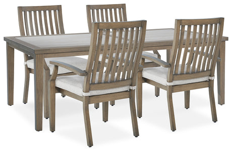 Rainier Ranch outdoor dining table and four beige cushioned chairs