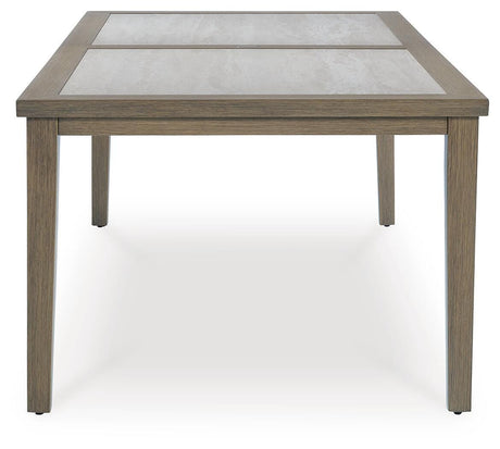 Rainier outdoor dining table and six chairs set in brown and beige, angled view