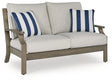 Rainier Ranch outdoor loveseat in brown and beige, angled view