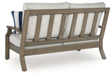 Close-up of loveseat armrest and cushion