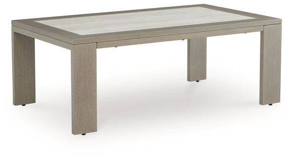Kimpton Isle Brown Outdoor Coffee Table angled view showing wood-look aluminum frame