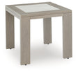 Kimpton Isle brown outdoor end table angled view showing tabletop and frame