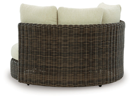 Side view of Kimora Outdoor Swivel Lounge Chair showing wicker texture