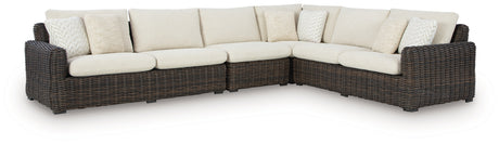 Kimora outdoor sectional close-up of wicker weave and cushions