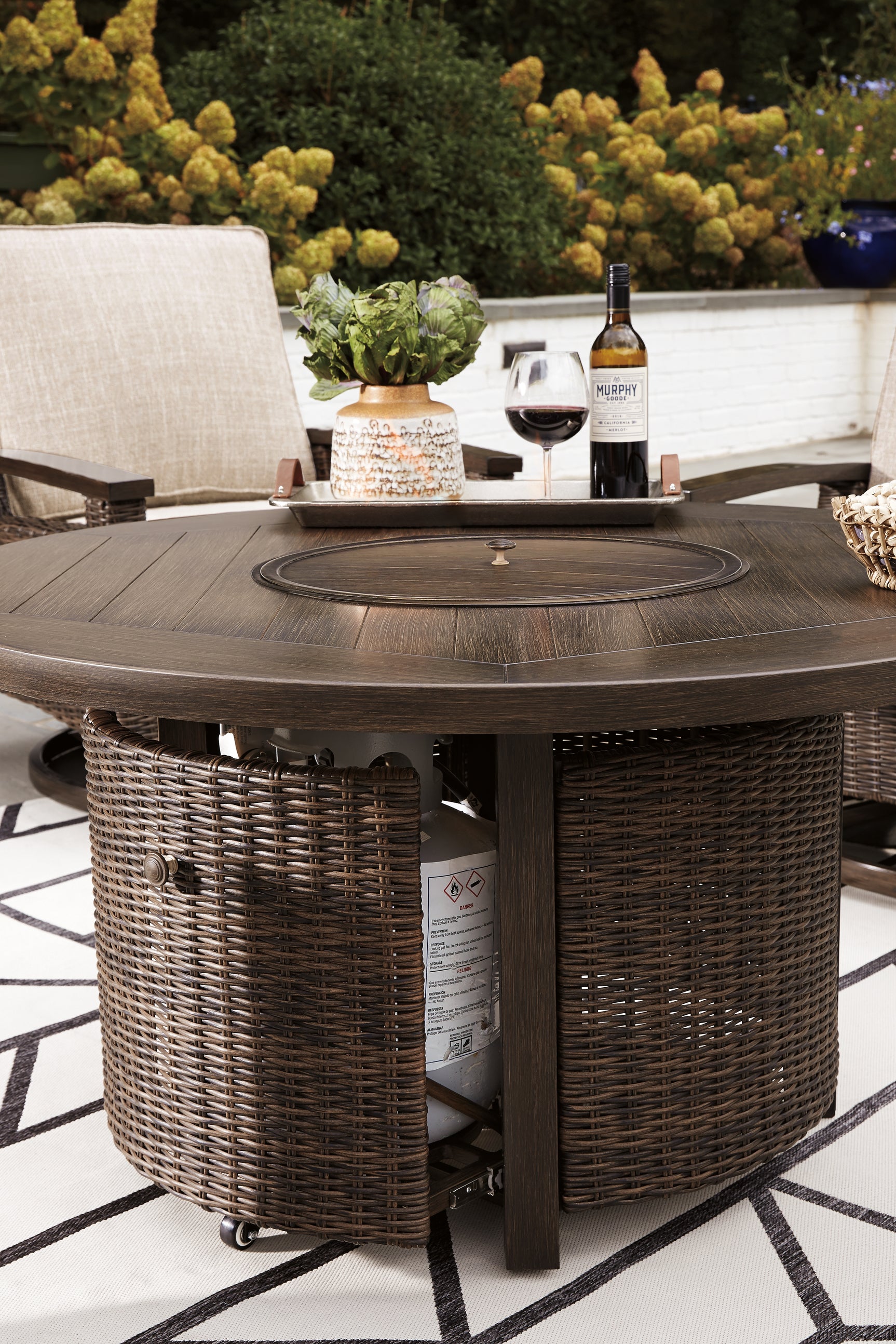 Top finish and base finish of fire pit table