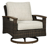 Swivel lounge chair side view showing wood-like armrest finish