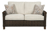 Front view Paradise Trail loveseat showcasing cushions