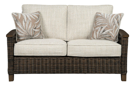 Front view Paradise Trail loveseat showcasing cushions