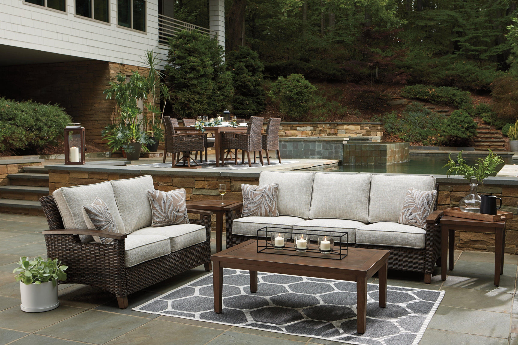 Paradise Trail Medium Brown Outdoor Sofa on deck setting